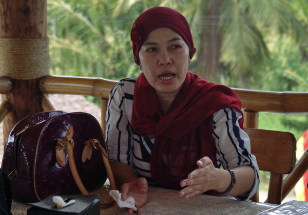 OFF DUTY. Laarni Sabang wife of PO1 Sandy Sabang of Datu Unsay Municipal Police Station says her husband, detailed as security escort to Bai Laila Uy Ampatuan, mother of then Datu Unsay mayor Andal Ampatuan, Jr., says he was off duty on November 23, 2009 and was with her in Talayan town to get lumber for the house they were planning to build. Sabang is a member of 1123 Advocates, an organization of families of policemen who allegedly were not involved in the massacre and who are demanding a "separate and speedy" trial for them. . MindaNews photo by Toto Lozano