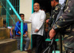 MONITORING. Comelec Commissioner Arman Velasco comes out from a heavily guarded registration center in Barangay Lower Dansalan in Marawi City on July 9, 2012. The Comelec expects to rid 30 percent of the fictitious voters in the Autonomous Region in Muslim Mindanao in the ongoing re-registration of voters.. MindaNews photo by Froilan Gallardo