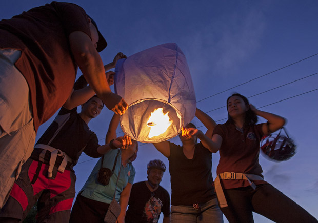 Members of the Iligan Medical Society release a night lantern at Mandulog Bridge dawn of Dec. 16, 2012, a year after Typhoon Sendong destroyed the bridge and wrought havoc in Iligan City and neighboring areas. MindaNews photo by Bobby Timonera