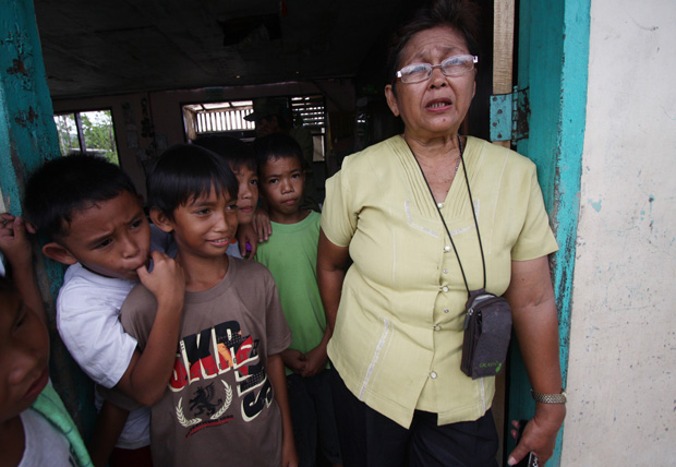 Lilia dela Cruz, Grade 4 teacher of Cabinuangan Central Elementary School in New Bataan, Compostela Valley province, expresses worry over her pupils, many of whom may have been affected by the floods caused by Typhoon Pablo. Mindanews Photo by Ruby Thursday More