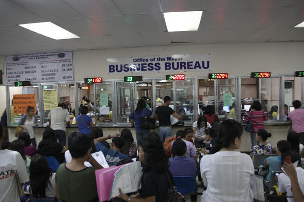  Entrepreneurs still flock the the Business Bureau of the Office the City Mayor to process the renewa of business permits. The renewal of business permits will run until 9pm of January 20. Mindanews Photo by Ruby Thursday More