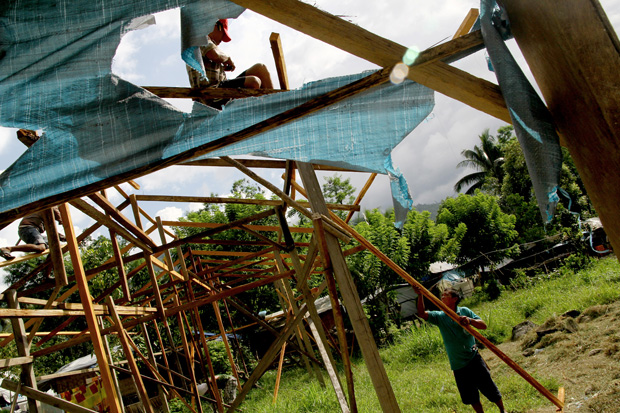 Volunteer carpenters build a makeshift classroom for elementary pupils in Barangay Andap, New Bataan, Compostela Valley province on May 27, 2013. The only elementary school in Andap was destroyed by typhoon Pablo on December 4 last year. MindaNews photo by Keith Bacongco