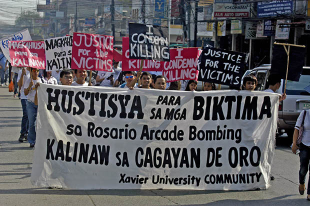 Teachers and students join the “Walk for Peace” in Cagayan de Oro City on Friday, August 2. The march was spearheaded by doctors and medical representatives who want justice for the eight persons who were killed and the 48 others who were wounded in the July 26 Limketkai Arcade bombing. MindaNews photo by Froilan Gallardo