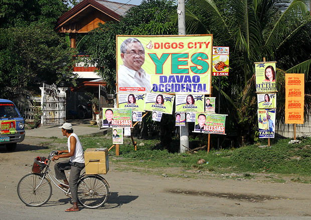 A giant tarpaulin supporting the creation of Davao Occidental province dots the national highway in Digos City in a photo taken on October 24. The plebiscite is set simultaneously with the barangay elections on October 28. The proposed province will cover the towns of Don Marcelino, Jose Abad Santos, Malita (as the capital), Santa Maria and Sarangani. MindaNews photo by Keith Bacongco