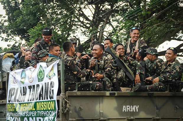 The AFP's Eastern Mindanao Command deploys at least 400 troops to super typhoon Yolanda-devastated areas in Leyte on Saturday, Nov. 16, 2013, to augment relief, recovery and rehabilitation efforts there. MindaNews photo by Keith Bacongco