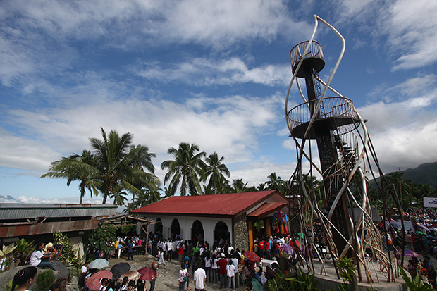 About 2,000 people attended the commemoration of Typhoon Pablo at the San Roque chapel on Wednesday, 4 December 2013. Practically all of the village center, except for the chapel, was devastated by the massive debris flow that passed by Andap, New Bataan, Compostela Valley. MindaNews photo by Ruby Thursday More Debug Info