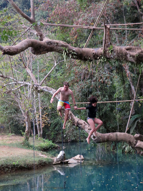 Tourists in their swimwears jump into the Blue Lagoon in Vangvieng, Laos. MindaNews photo by Jesse Pizarro Boga