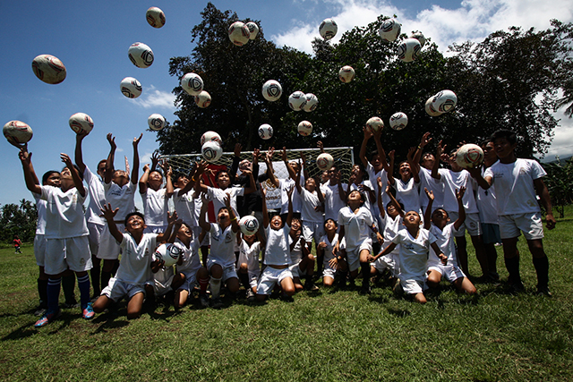 FROM SPAIN WITH LOVE Kids under the Social School Sports of ANAKK-Sta Cruz group celebrate after receiving 41 footballs from football giant Realmadrid Foundation and Fundacion Mapfre on Saturday, 26 April, in Sta Cruz, Davao del Sur. MindaNews Photo by Ruby Thursday More
