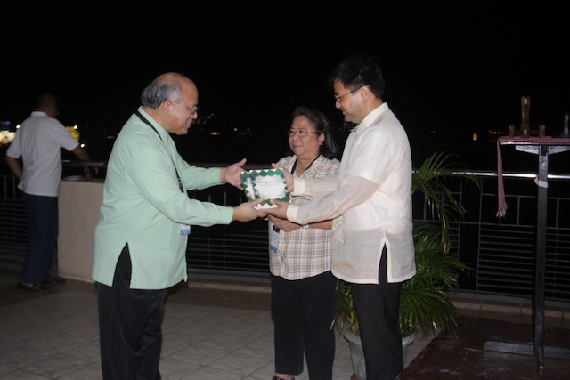 The two-volume book, "Bangsamoro: Documents and Materials" was presented to Fr. Joel Tabora, President of the Ateneo de Davao University (left) by  Dominique Cimafranca, Ateneo de Davao University Publication Office Director (right) and MindaNews' Carolyn O. Arguillas. Photo courtesy of IPO ADDU