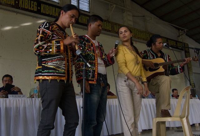 North Cotabato Rep. Nancy Catamco, chair of the National Cultural Communities, sings songs on Unity and Peace with her fellow Obo-Manobos during the public hearing in Upi, Maguindanao on October 22.  MindaNews photo by Toto Lozano