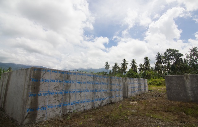 NUMBERED. The public cemetery in New Bataan, Compostela Valley has four concrete burial vaults where the unidentified victims of super typhoon Pablo on December 4, 2012 were buried. Their individual niches are numbered, preceded by the code PNB-12 for “Pablo New Bataan, 2012.” who perished in Typhoon Pablo on December 4, 2012 are marked by numbers in this photo taken on November 1, 2014 at a public cemetery in New Bataan, Compostela Valley. MindaNews photo by Toto Lozano 