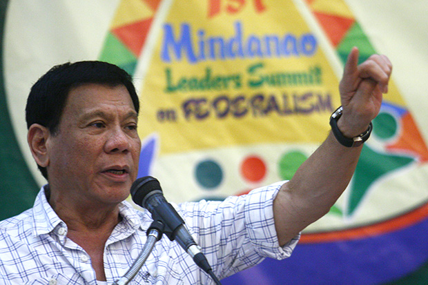 Davao City Mayor Rodrigo Duterte pushes for a federal form of government during the Mindanao Leaders Summit on Monday (December 2) in Davao City. At the same time, he rejects calls for him to run for president in 2016. Mindanews Photo by Keith Bacongco