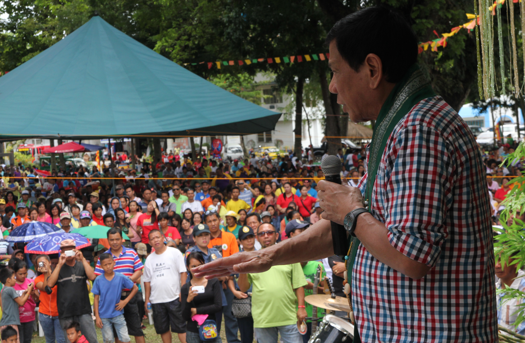 Davao City Mayor Rodrigo Duterte speaks at the 64th founding anniversary of M'lang in North Cotabato on August 3, 2015. MindaNews photo by TOTO LOZANO