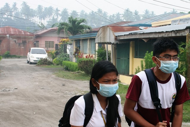 Some residents of General Santos City have been wearing masks as a precaution against the haze that blankets the area and other parts of Mindanao, as shown in this photo taken on 23 October 2015. MindaNews photo by Rommel Rebollido