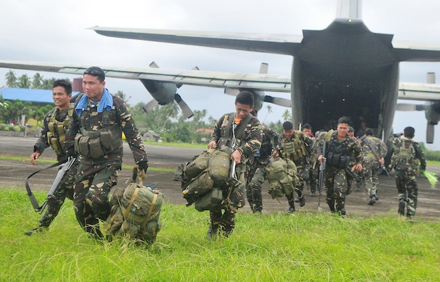 ANTI-INSURGENCY CAMPAIGN. Soldiers of the Army 16th Infantry Battalion arrived by C-130 plane in Tandag, Surigao Del Sur on Wednesday, Jan. 20, 2015. More soldiers are deployed to augment troops fighting the communist insurgency. Four battalions are now currently deployed in Surigao del Sur province. MindaNews photo by Froilan Gallardo