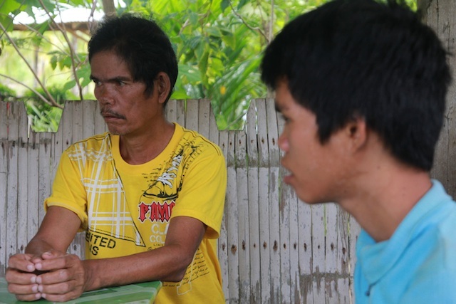FATHER AND SON. Orlando "Kaido" Engo and his 15-year old son Jerome narrate their ordeal from the hands of Special CAFGU Armed Auxiliary (SCAA) and Army Corporal Sandy Batolbatol of the 72nd Infantry Battalion during an interview at Malita Tagakolu Mission, Barangay Demoloc, Malita, Davao Occidental on March 11, 2016. The 52-year old farmer and his son were subjected to torture on February 19 at the SCAA detachment. A video was posted on Facebook last March 9, prompting the military to conduct an investigation. MindaNews photo by TOTO LOZANO 