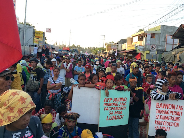 Protesters at the barricade in Panacan , Davao City, fronting the Eastern Mindanao Command on March 18. The protest action caused a six-hour gridlock. MindaNews photo by ANTONIO L. COLINA IV 
