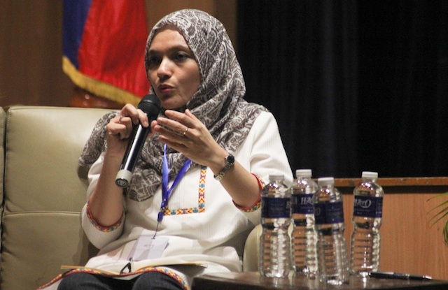 Shadia Marhaban co-founder of the Aceh Women's League shares her experience on transitions to peace in Aceh after the 2005 signing of the peace agreement during a symposium Titayan: Bridging for Peace at Ateneo de Davao University on April 21, 2016. MindaNews photo by TOTO LOZANO