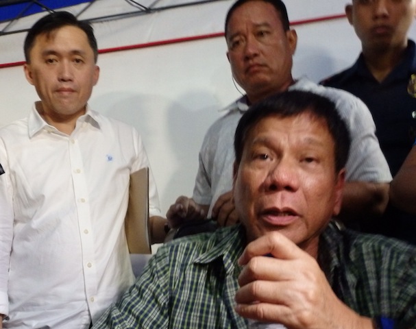 President-elect Rodrigo Duterte and Christopher Lawrence "Bong" Go (left) after a press conference in the "Malacanang of the South" in Panacan, Davao City on May 31. MindaNews photo by Carolyn O. Arguillas 