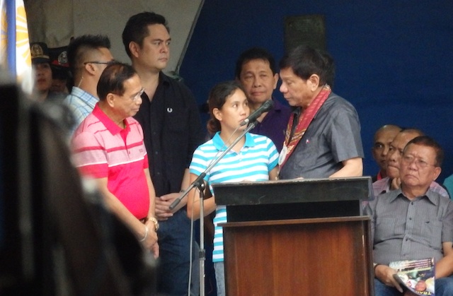 President-elect Rodrigo Duterte welcomes Marites Flor who was released early Friday morning in jolo, Sulu in front of the residence of outgoing Sulu Vice Governor Sakur Tan. Beside Flor is returning Presidential Adviser on the Peace Process Jesus Dureza who fetched Flor in Jolo. MIndaNews photo by Carolyn O. Arguillas 