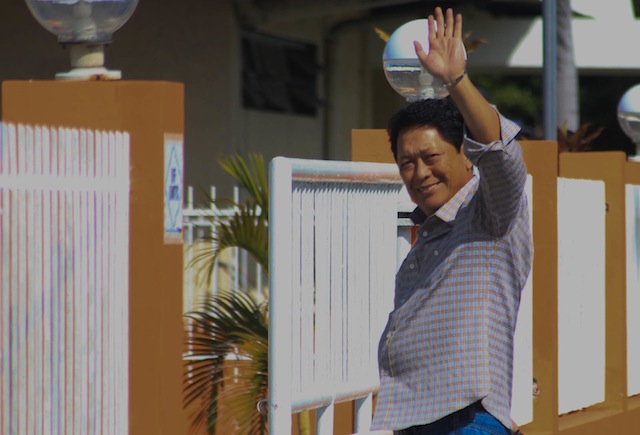 Laywer SIlvestre Bello III, Incoming Labor Secretary and government peace panel chair in the negotiations with the National Democratic Front, waves to reporters as he enters the "Malacanang of the South" in Panacan, Davao City on May 31, 2016. MindaNews photo by TOTO LOZANO