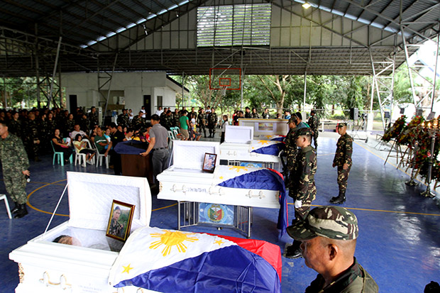 The remains of the four Army soldiers killed in an encounter with the New Peoples Army (NPA) in Monkayo and Maragusan towns in Compostela Valley province on August 5 are now in the Eastern Mindanao Command in Davao City. Twelve others were injured while two rebels were reported killed. MindaNews photo by KEITH BACONGCO 