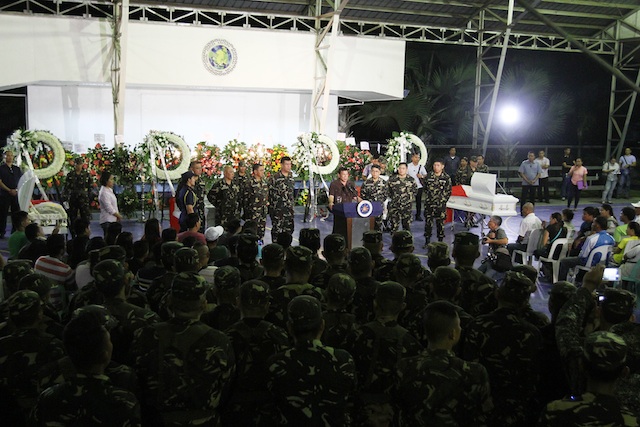 President Rodrigo Duterte speaks before the families of the four slain soldiers and troops at the covered court of the the Eastern  Mindanao Command in Davao City shortly past midnight Sunday, August 7, 2016, where he warned the National Democratic Front to stop using landmines “or we stop talking (and) fight another 45 years.”  Mindanews Photo