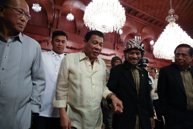 President Rodrigo Duterte tours Moro National Liberation Front (MNLF) Chair Nur Misuari inside Malacañan Palace on November 3. KING RODRIGUEZ/ Presidential Photo 