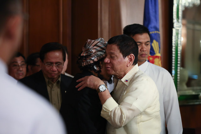 President Rodrigo Duterte bids farewell to Moro National Liberation Front (MNLF) founding Chair Nur Misuari following their meeting in Malacañan on November 3. KING RODRIGUEZ/ Presidential Photo 