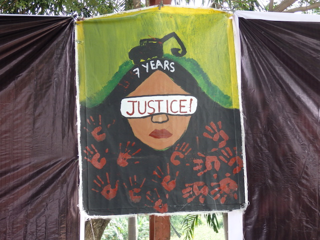 Art work by orphans of the victims of the Ampatuan Massacre, as backdrop to the mass to commemorate the 7th year of the Nov. 23, 2009 massacre at the massacre site in Ampatuan, Maguindanao Sunday noon. Citing the slow pace of justice, Fr. Rey Carvyn Ondap said this is “no longer an Ampatuan Massacre. This is Judicial Massacre.” MindaNews photo by Carolyn O. Arguillas 