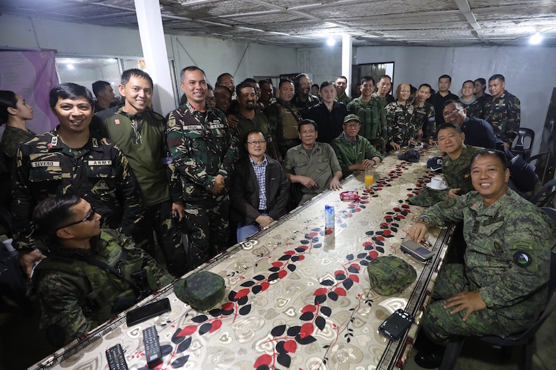 President Rodrigo Duterte visits troops in Marawi on 21 September 2017, Day 122 of the Marawi Crisis. This is his fifth visit to Marawi since the armed clashes with the Maute Group started on May 23. Accompanying the President were Defense Secretary Delfin Loorrenzana, Presidential Adviser on Military Affairs Arthur Tabaquero, Armed Forces of the Philippines (AFP) Chief of Staff General Eduardo Año and Special Assistant to the President Christopher Lawrence Go. The President also tagged along Paolo Santos, Jimmy Bondoc and Arnel Ignacio to provide entertainment to the troops. Richard Madelo / PRESIDENTIAL PHOTO